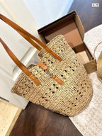 PANIER MEDIUM IN RAFFIA AND VEGETABLE-TANNED LEATHER