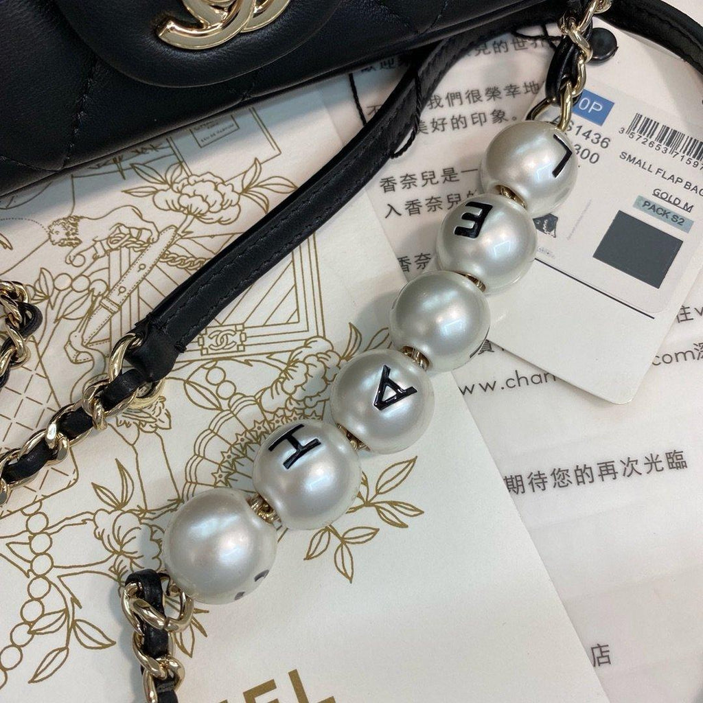 Pearl logo strap Flap Bag Black