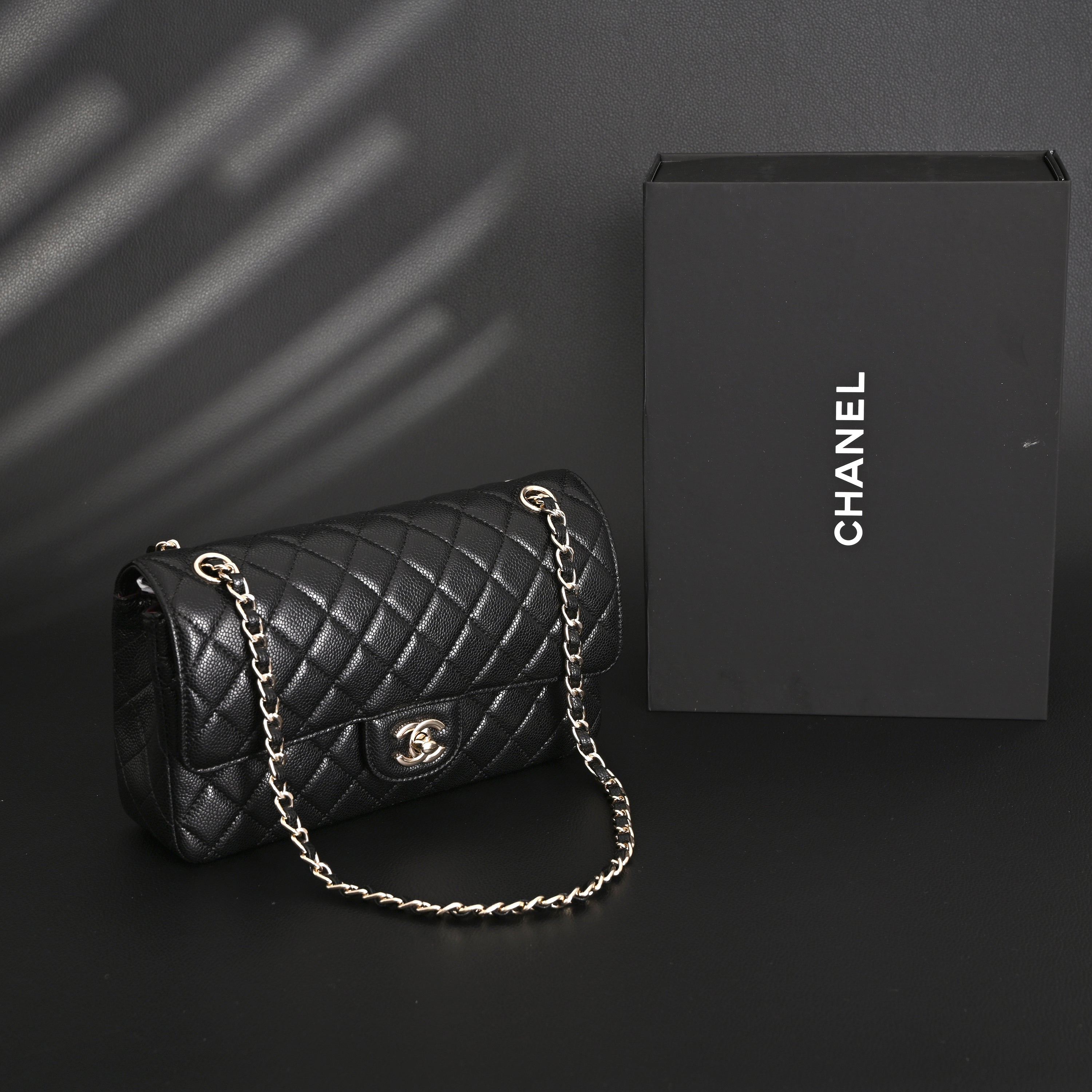 Classic Flap Bag  Black Quilted Caviar Leather with Gold-Tone Hardware