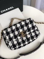 19 Black and white wool tweed small Flap Bag
